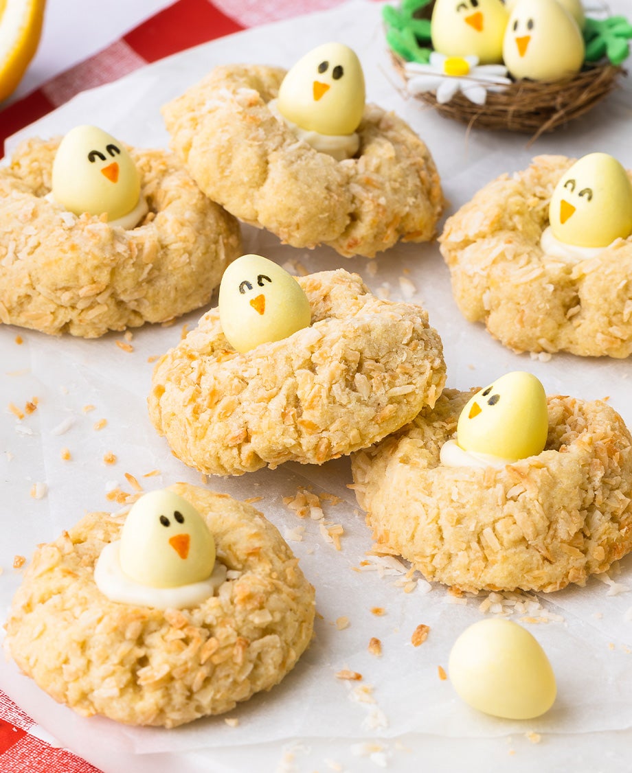 Coconut cookies topped with Milkybar white chocolate egg ‘chicks’