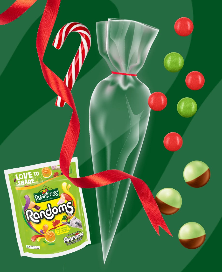 Collage of a packet of Rowntrees Randoms sweets with individual Smarties & Peppermint Aero Bubbles on a festive green backgro