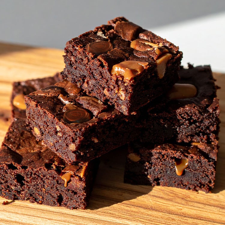 Fudge dark chocolate brownies with pockets of melted Rolos oozing out caramel