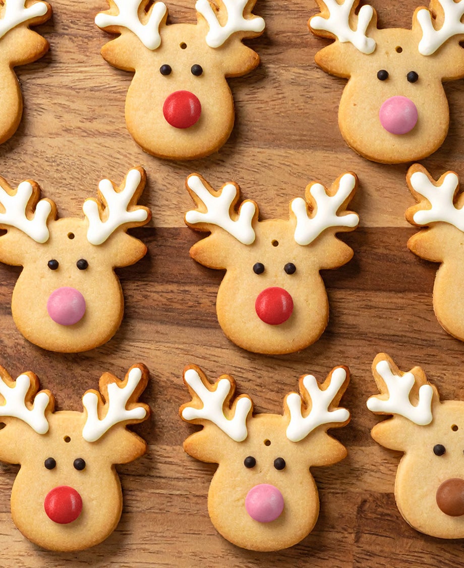 reindeer cookies on a wood table