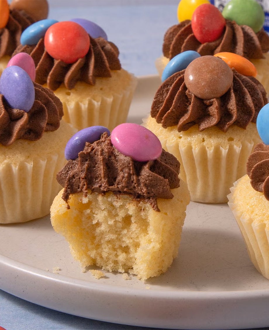 smarties cupcakes on a plate
