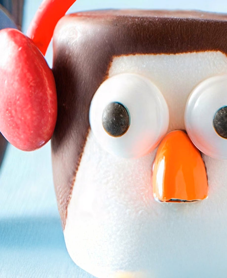 Penguin marshmallow, with two edible eyes, a quarter orange Smartie for the beak, plus two smarties and a piece of red liquor