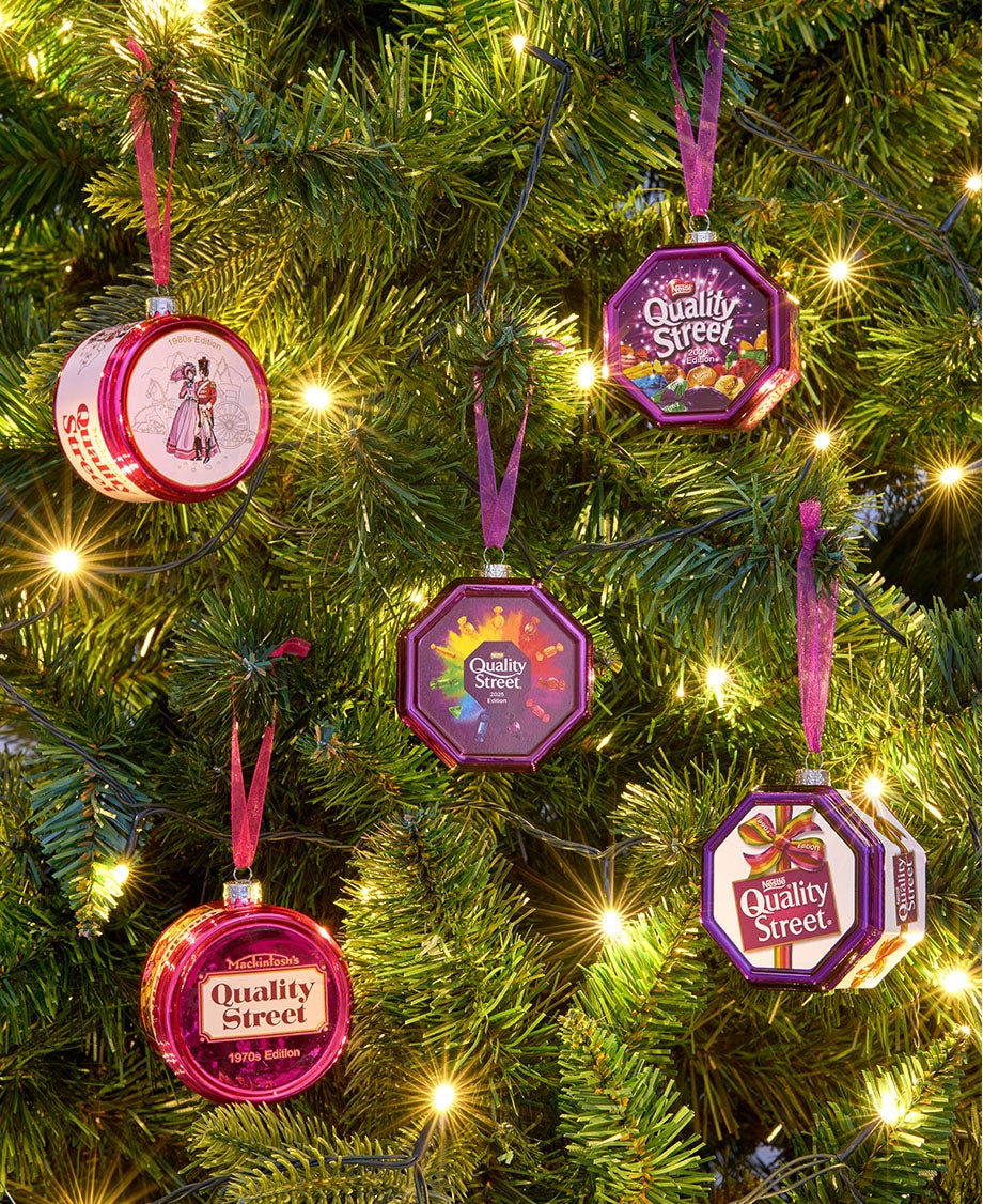 Mini versions of Quality Street tins, made into Christmas tree decorations. 
