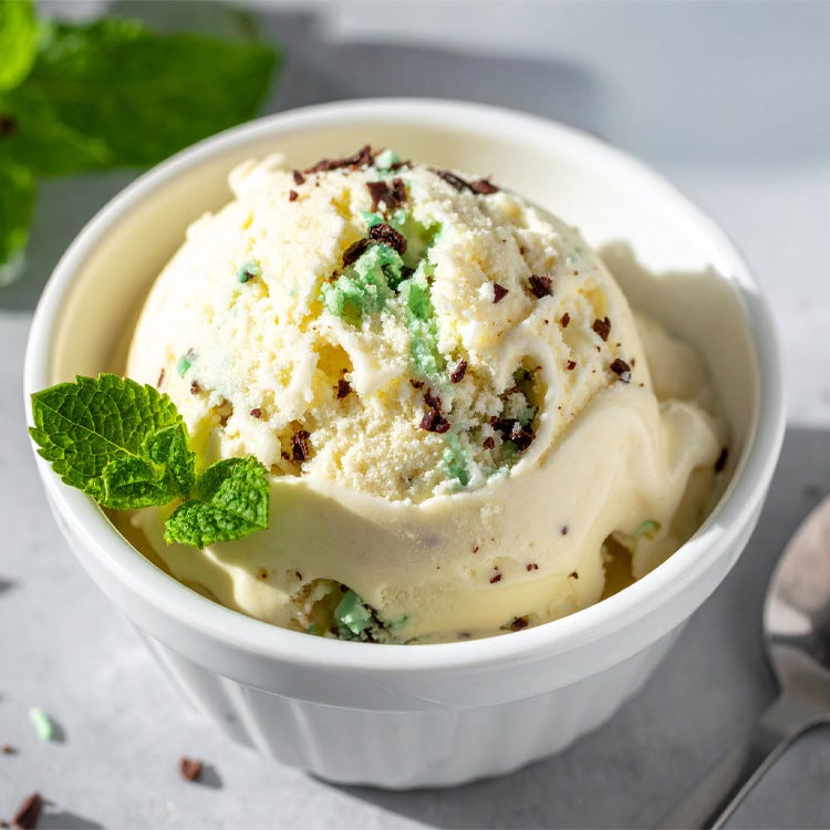 Bowl of creamy mint chocolate ice cream made with Aero Peppermint