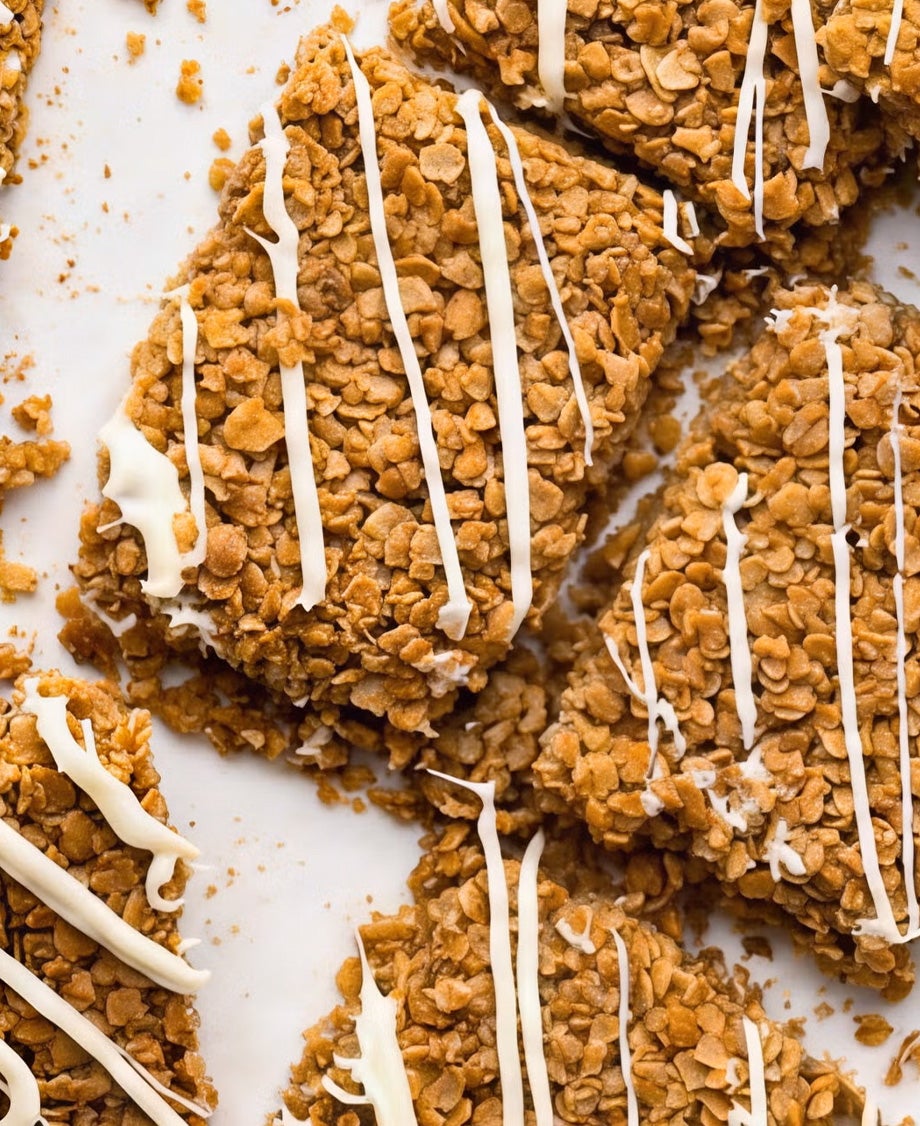 Golden flapjack squares drizzled with Milkybar white chocolate 