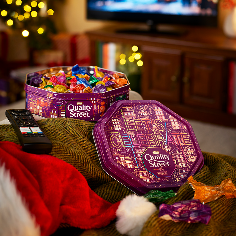 Quality Street tin filled with assorted chocolates